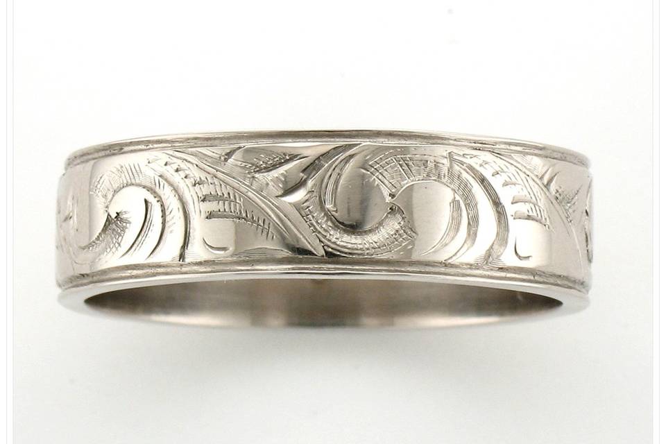 Hand-engraved Wedding Band by Larry Pauling for The Jewelbox in Ithaca, NY - available in different precious metals, styles, and sizes.