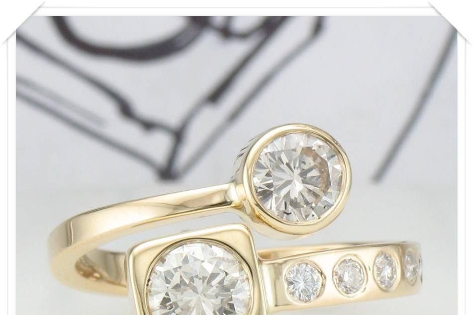 Custom Bypass Ring in 14k yellow goldset with customer's heirloom diamonds - by Micky Roof for The Jewelbox in Ithaca, NY - a classic design for custom rings.