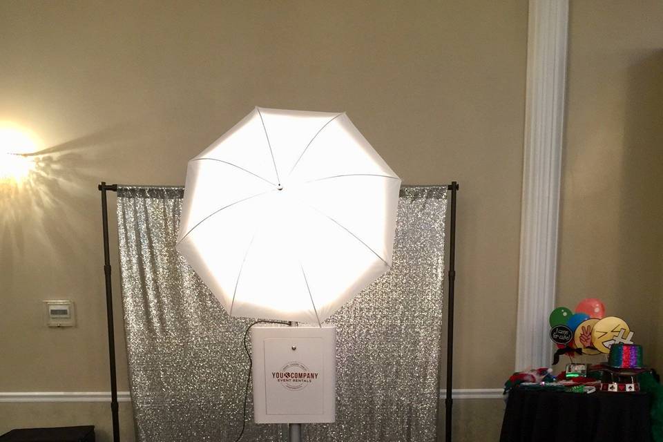 Luxury open air photo booth set up: choice of backdrop, custom props, unlimited prints, personalized hard cover album for guests to sign, Facebook album, attendants and USB with copy of all images