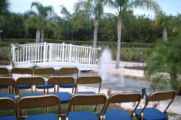 The tropical landscaping and water falls are the perfect back drop for any outdoor ceremony and reception