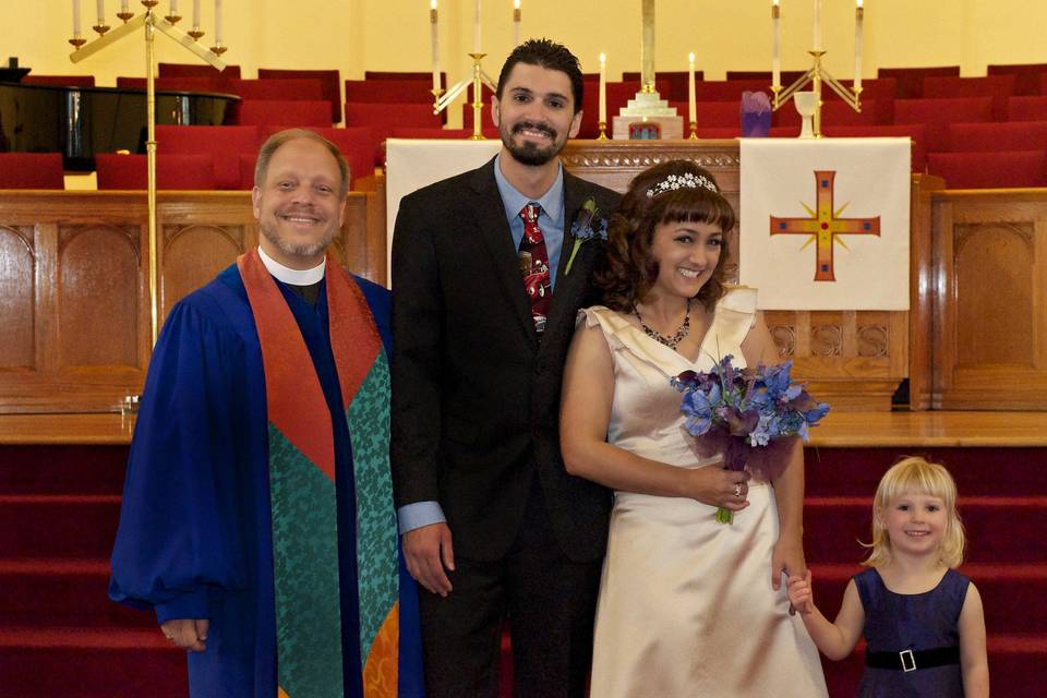 Officiant and the newlyweds