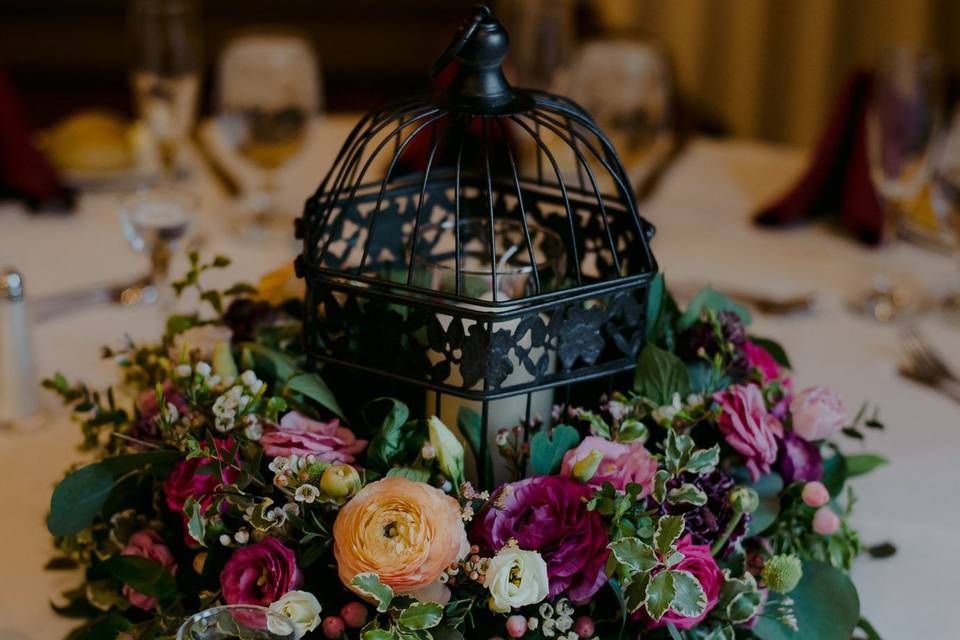 Lantern with floral wreath