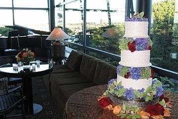 We have decorated hundreds of wedding cakes with flowers.