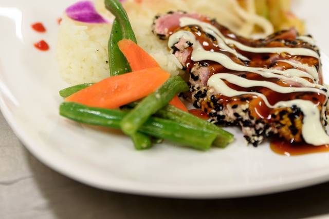 Black and White Tuna with Burnt Honey Teriyaki Reduction and Cucumber Wasabi.  Kim Chi, Coconut Rice and Wild Rice Puff