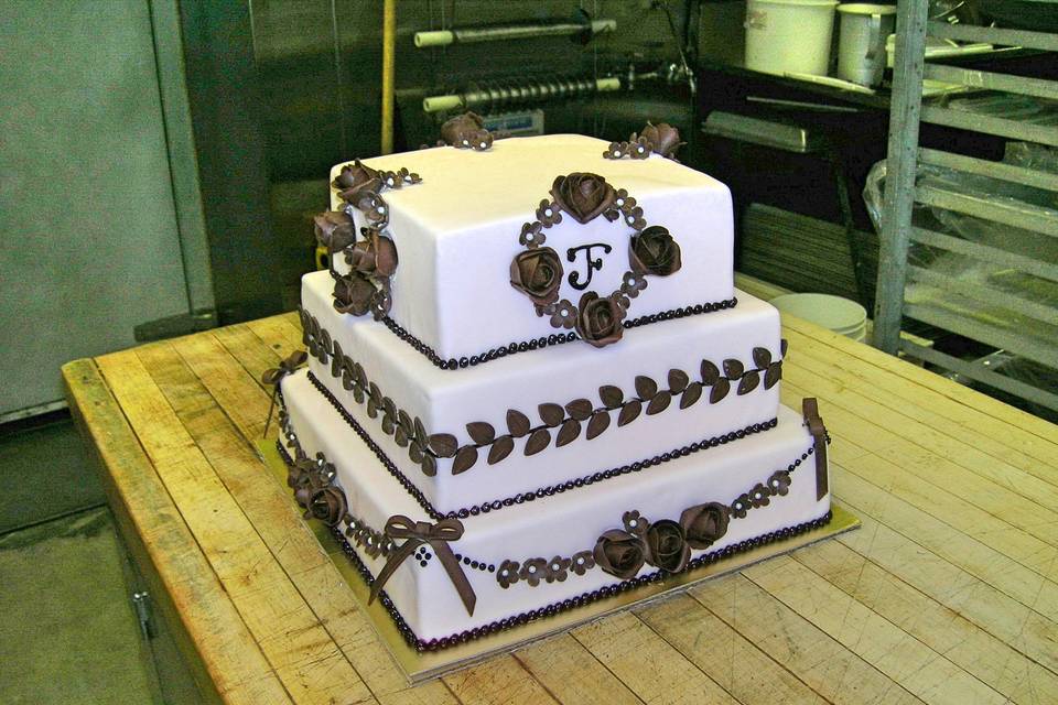 3-tier wedding cake with chocolate detailing