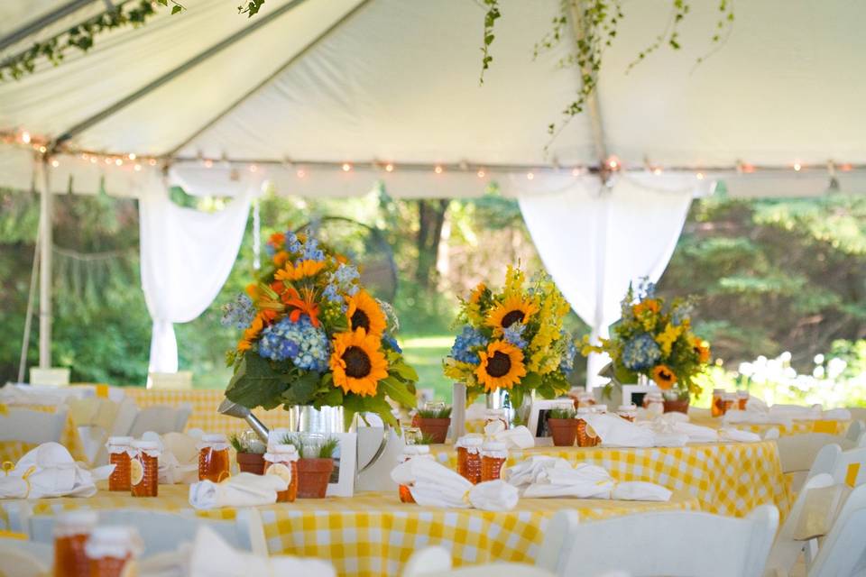Tent setup with sunflower decorations
