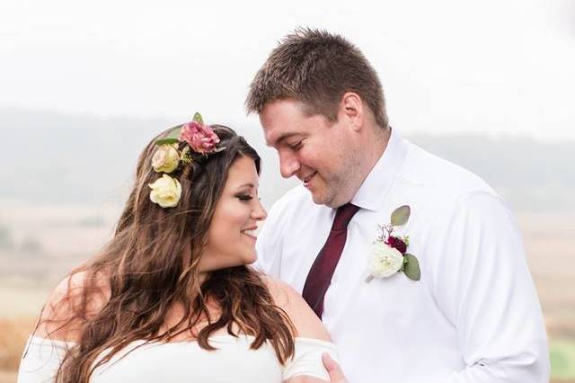 Pregnant bride with groom