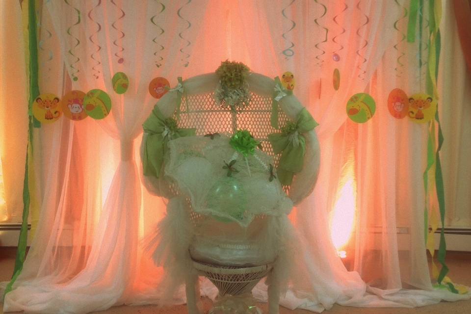 Jungle theme back drop for a baby shower with uplighting! What a difference uplighting makes.