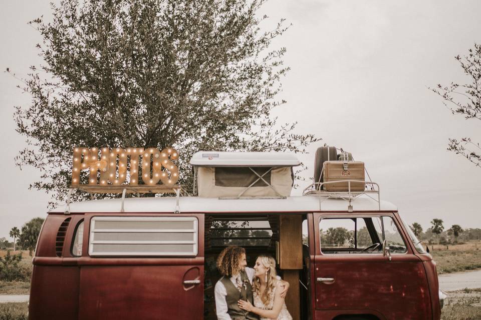 Newlyweds sitting in the booth