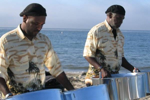 Photo from a beach wedding ceremony in Santa Barbara. Our steel drum solo, duo and trio are very popular for beach weddings.