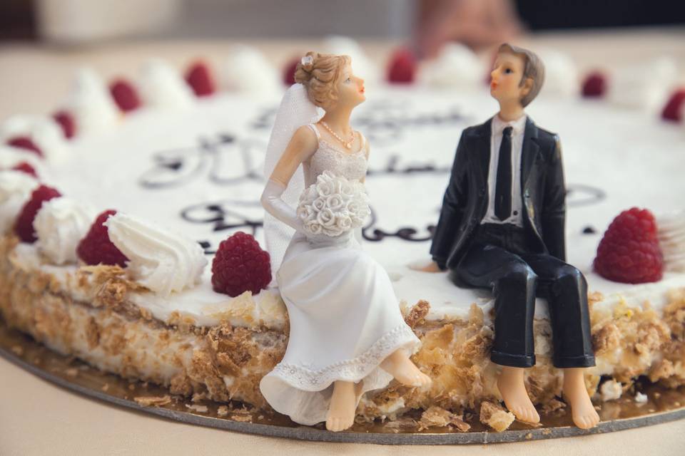 Pie with bride and groom figurines