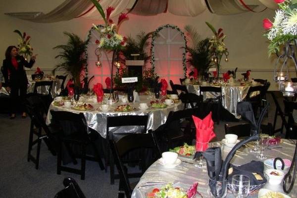Drape fabric , linens chairs and tables.