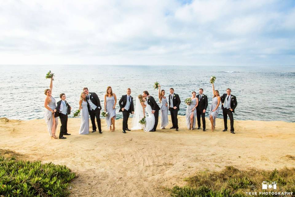 The couple with their bridesmaids and groomsmen