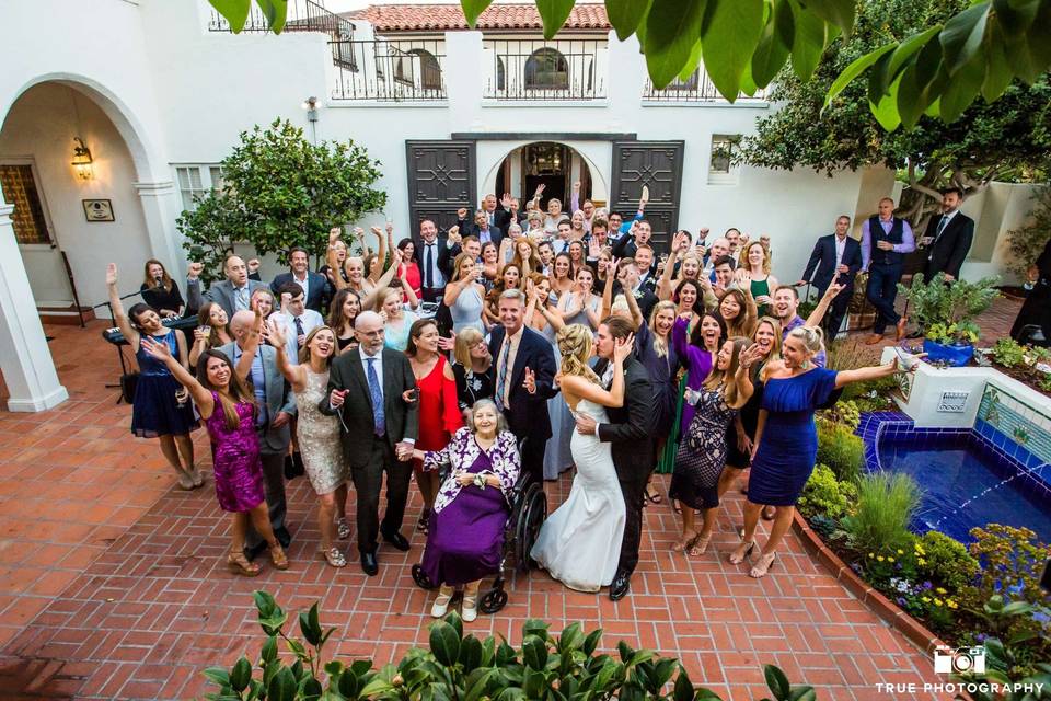 The couple with the wedding attendants