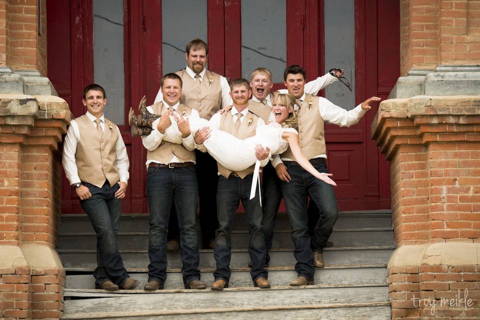 The couple with their groomsmen