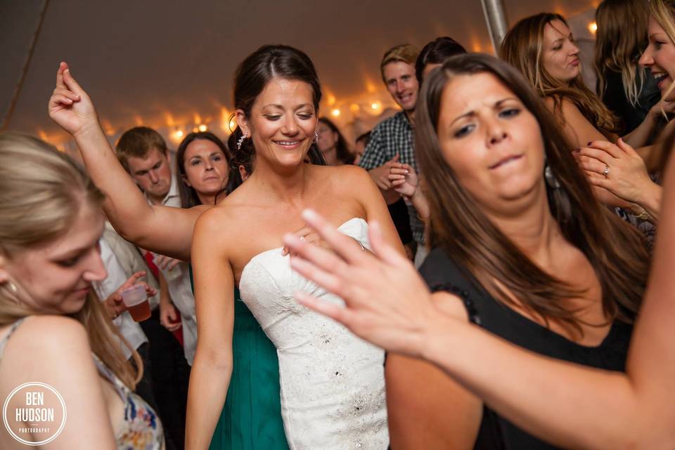 Bride and guests dancing