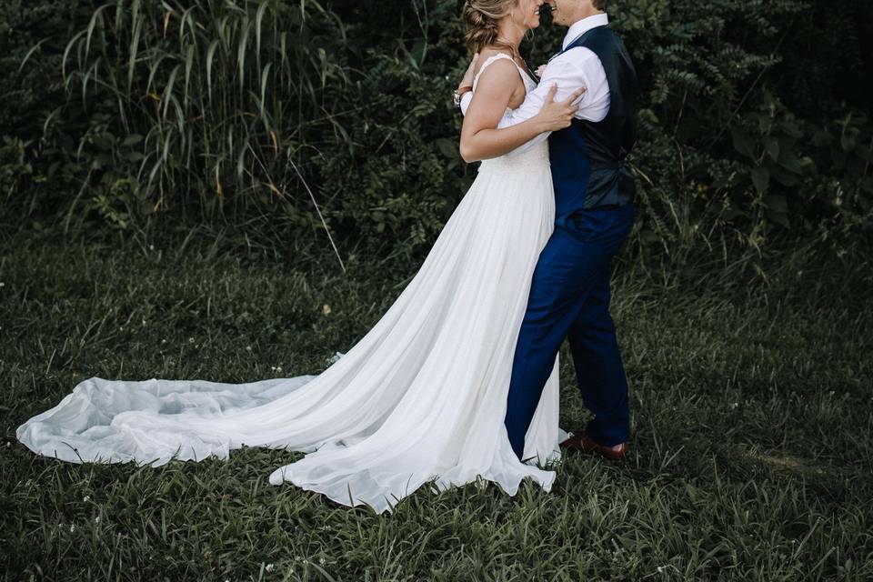 Newlyweds holding each other | Billie-Shaye Style Photography, LLC