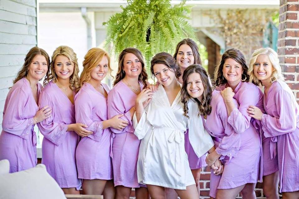 Bride and her bridesmaids getting ready