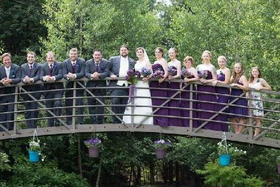 The couple with the bridesmaids and groomsmen