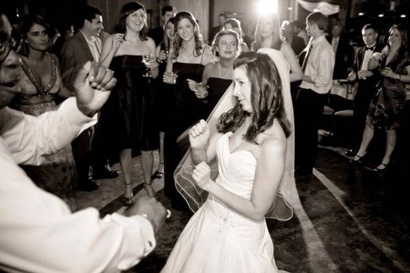 Bobby J dances with bride.