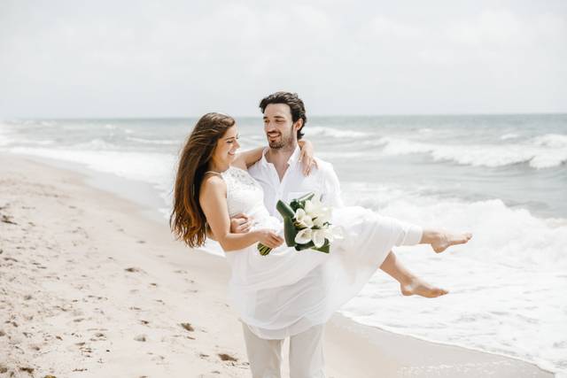 Number 3 - Groom carrying bride.jpg
