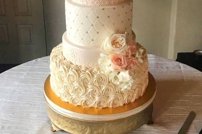 Five tier cake with flowers