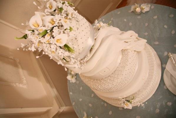 The pastry chef did a beautiful job in recreating the 'quilted' look of the bride & groom's invitations.  A masterpiece!
