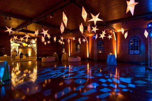 This wedding was held at Shelburne Farms with lighting produced by Dark Star Lighting & Production.