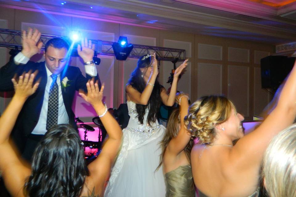 Dancing couple and bride