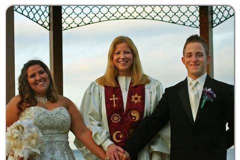 Minister with the bride and groom