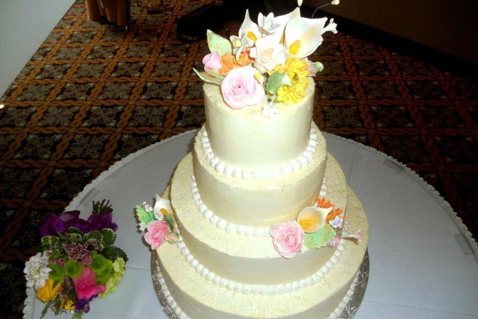 4 teir wedding cake with hand made sugar flowers...