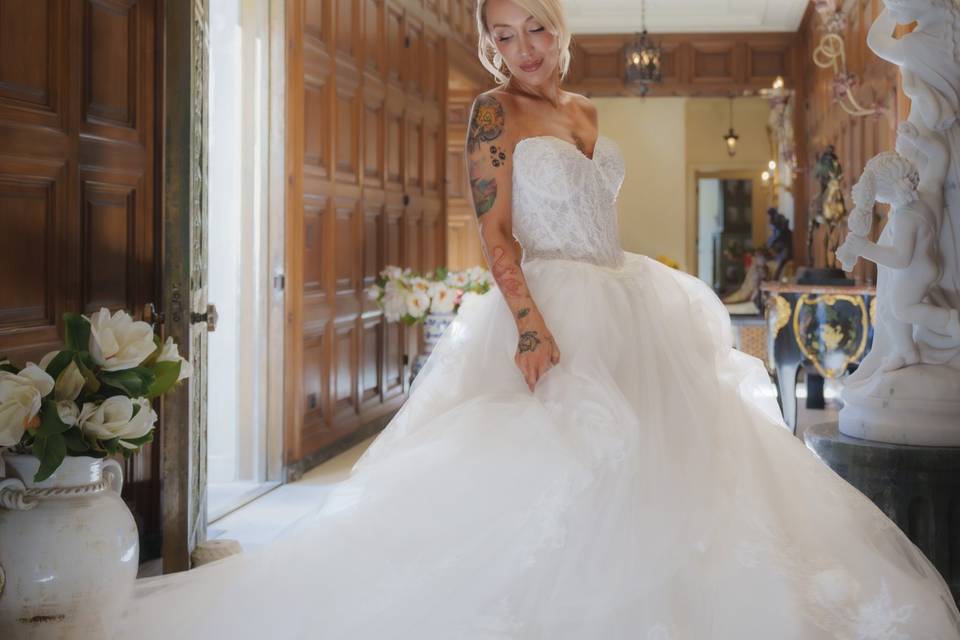 Bride showing off her dress