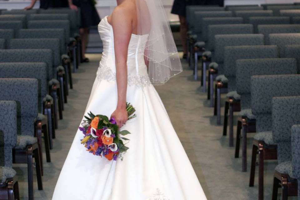 A bride on the aisle - Triston's Photography