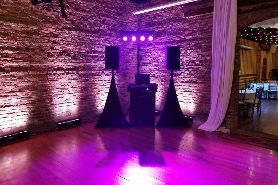 DJ set up with uplighting