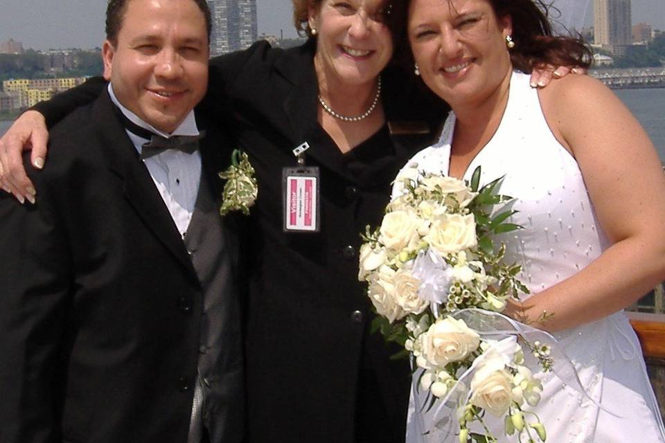 Officiant and the newlyweds