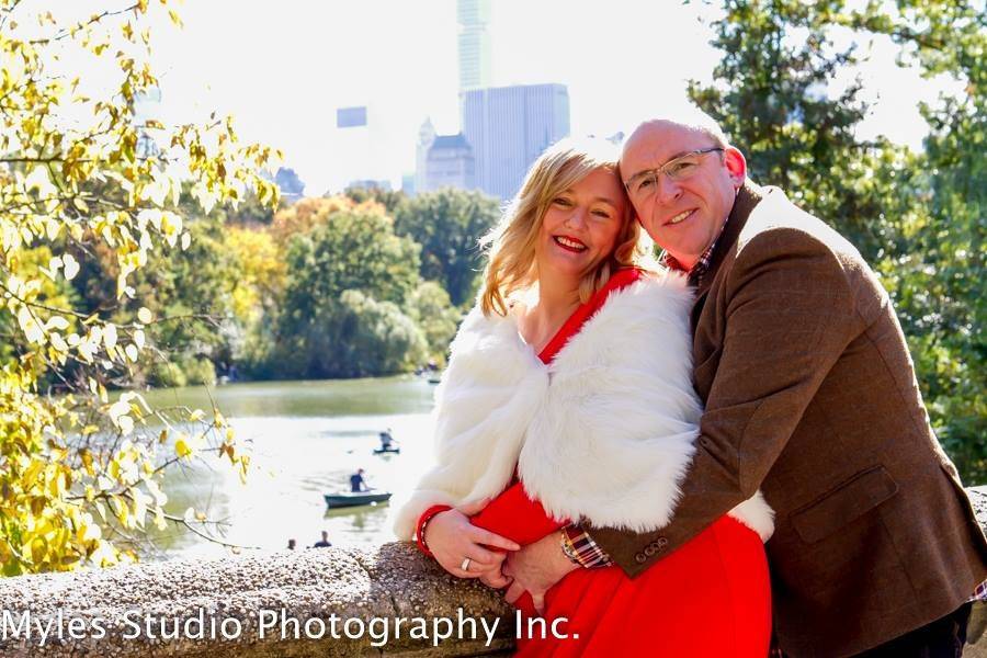 Bride and groom in the snowy woods