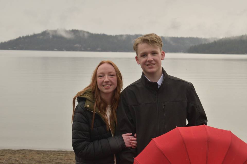 Happy couple by lake