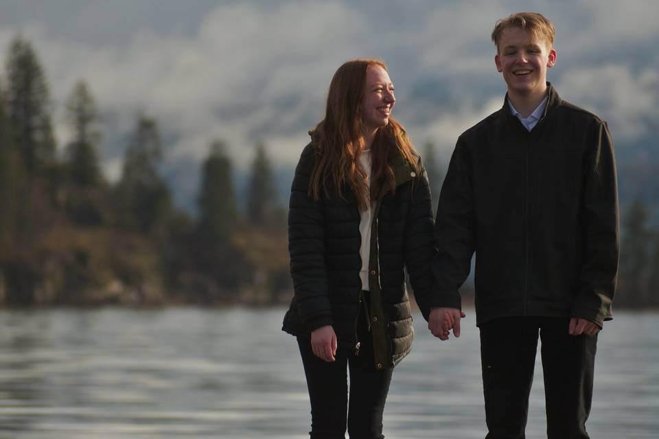 Couple holding hands.