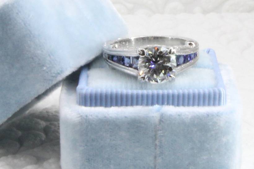 Custom cut Sapphire and Diamond engagement ring.