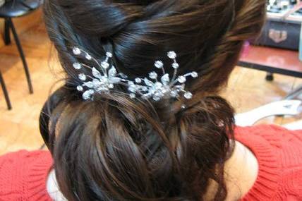 Wedding hair updo with hair accessory