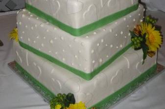 Green fondant ribbon w/ multi designs and fresh flowers