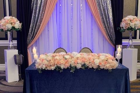 Sweetheart table with backdrop