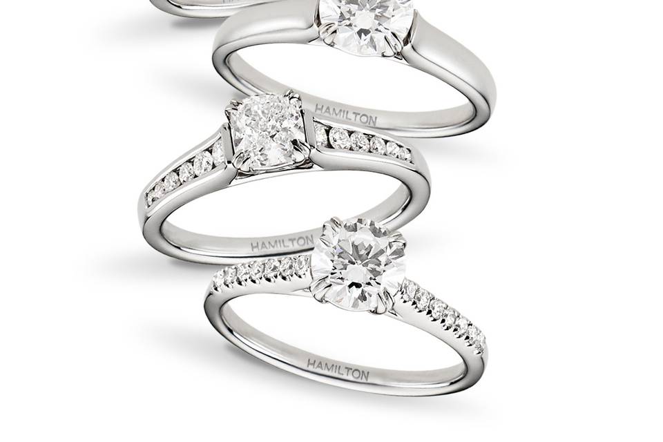 Four silver rings with diamond