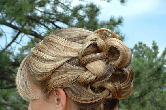 Side partial updo with flowers