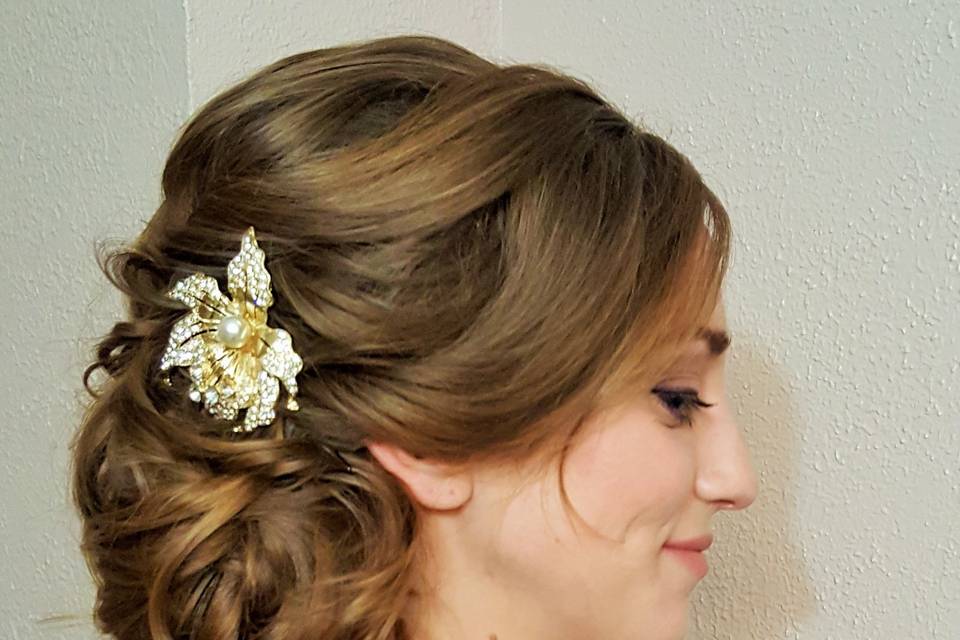 Messy updo with hair accessory