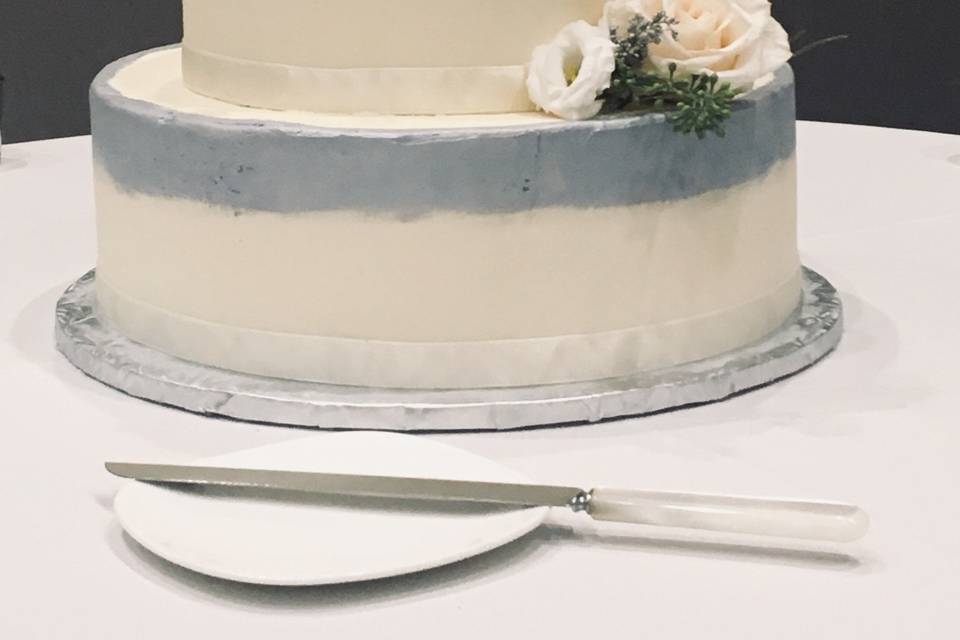 Wedding cake with simple flowers