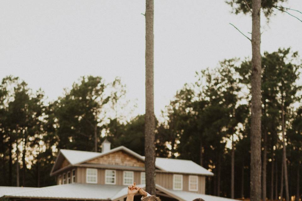 Couple in front of The Barn