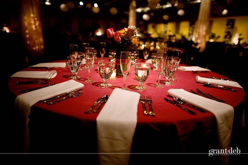 A red and white dining table setup
