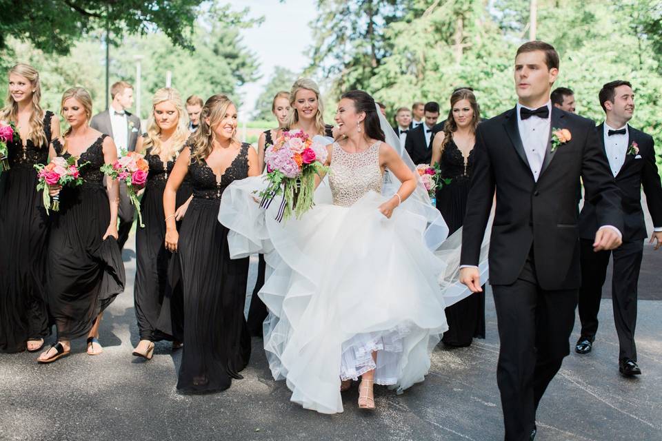 The couple with the bridesmaids and
groomsmen