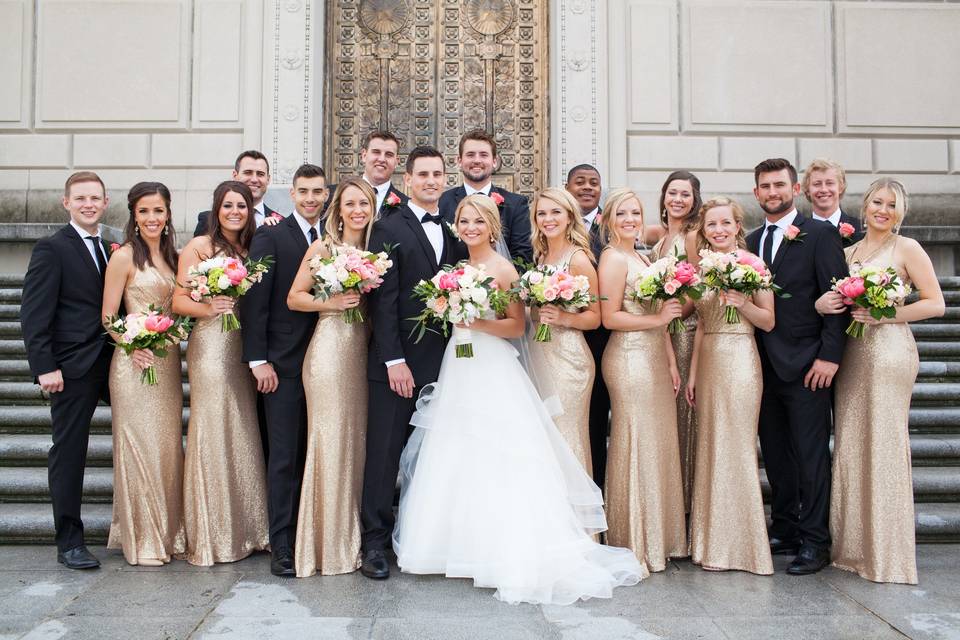 The couple with the bridesmaids and
groomsmen